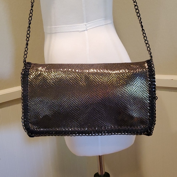 Tarnish Handbags - Tarnish like new clutch
